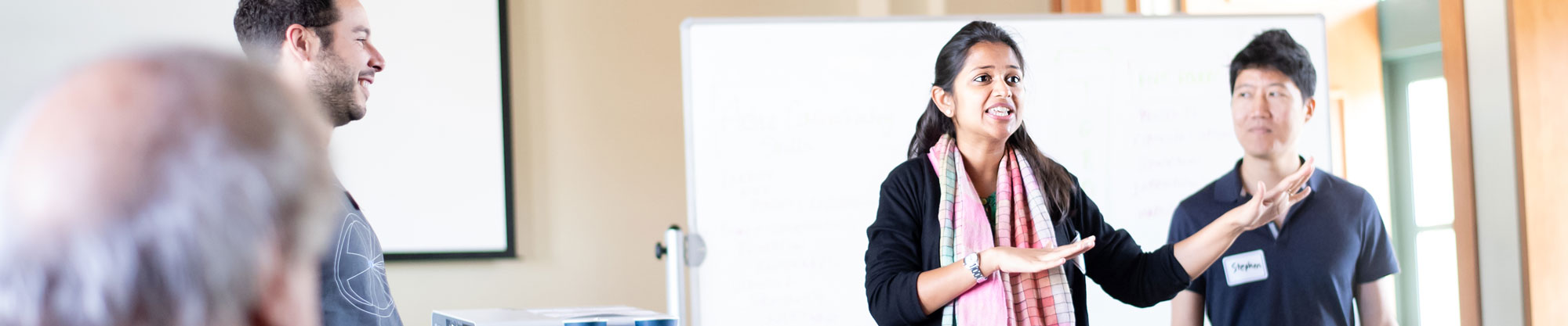 A woman gestures while speaking