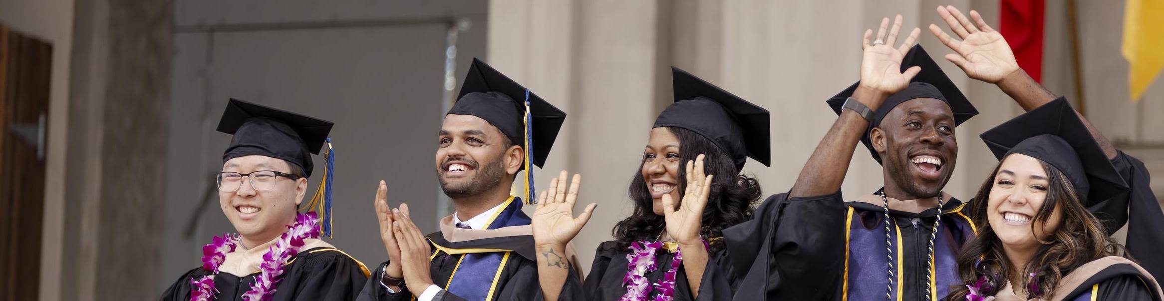 Students celebrating at graduation